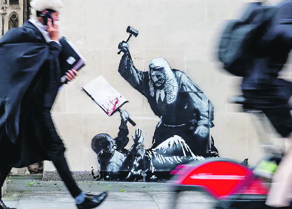 Procura-se Banksy,  o guerrilheiro do stencil
